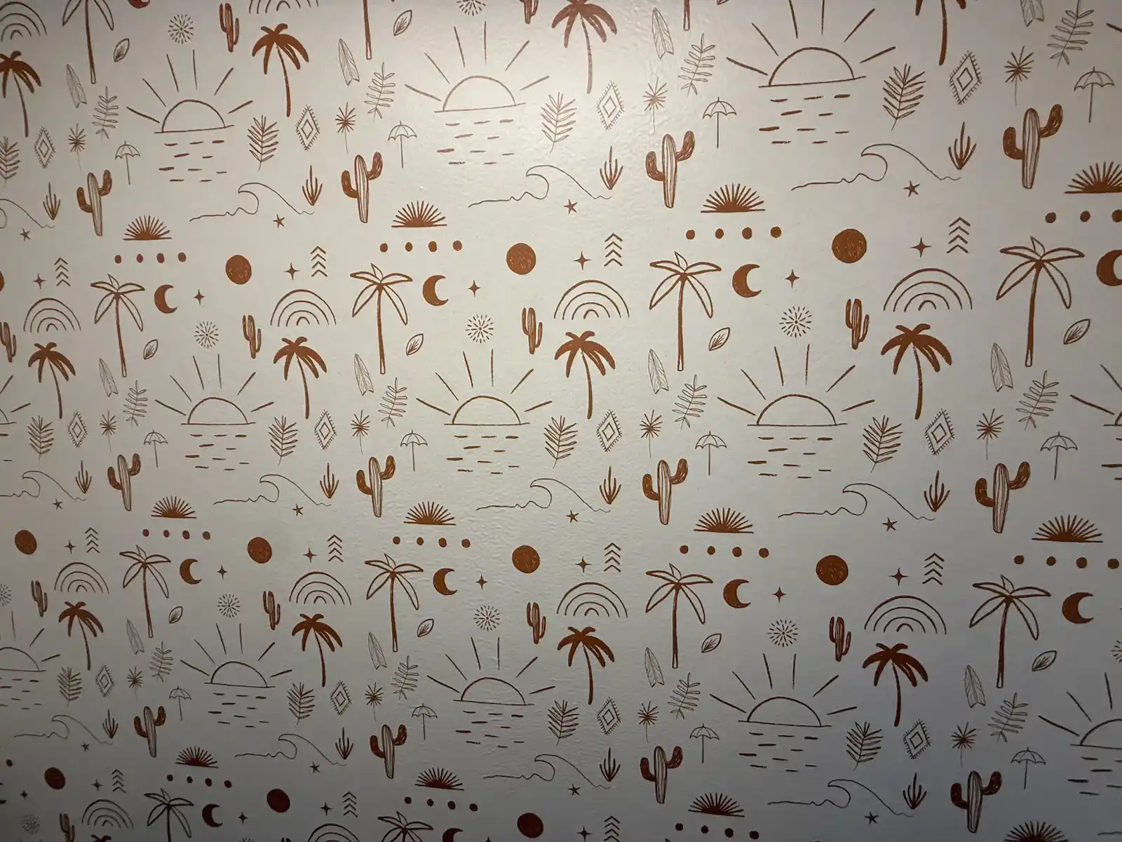 Wallpaper pattern across a wall surface near an interior corner